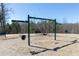 Community swings and open space for children to play in a safe and enjoyable environment at 516 Altamaha Ct, Locust Grove, GA 30248