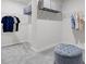 Spacious walk-in closet with carpeted floor, white walls and adjustable shelves for storage at 516 Altamaha Ct, Locust Grove, GA 30248
