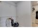 Walk-in closet with custom shelving and clothing racks at 516 Altamaha Ct, Locust Grove, GA 30248
