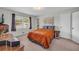 Relaxing bedroom with carpet flooring, a window, and neutral wall color at 405 Emory St, Oxford, GA 30054