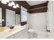 Bathroom with double vanity, a separate shower, and a soaking tub at 5065 Hickory Hills Dr, Woodstock, GA 30188