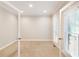 Bright office space with carpet, neutral walls, crown moulding, and multiple windows allowing for natural light at 5065 Hickory Hills Dr, Woodstock, GA 30188