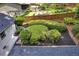 Backyard features landscaped plantings with wooden fence at 529 Greystone Trl, Marietta, GA 30068
