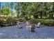Backyard with Adirondack chairs around a fire pit at 529 Greystone Trl, Marietta, GA 30068