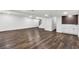 Finished basement features wood flooring, a wet bar, and recessed lighting at 529 Greystone Trl, Marietta, GA 30068