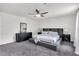 Serene main bedroom featuring plush carpet, large windows, and neutral color palette at 529 Greystone Trl, Marietta, GA 30068
