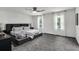 Serene main bedroom featuring plush carpet, large windows, and neutral color palette at 529 Greystone Trl, Marietta, GA 30068