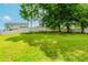 Spacious, well-manicured backyard with ample green space and privacy fencing at 855 Madison Chase Way, Lawrenceville, GA 30045