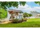 Spacious backyard with a deck and mature trees, perfect for entertaining at 855 Madison Chase Way, Lawrenceville, GA 30045