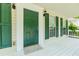 A view of the home's front door and porch, featuring a charming painted deck at 855 Madison Chase Way, Lawrenceville, GA 30045