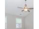 Bright, airy main bedroom with a vaulted ceiling, fan, and large windows at 855 Madison Chase Way, Lawrenceville, GA 30045