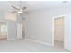 Spacious main bedroom with vaulted ceiling, ceiling fan, ensuite bathroom, and walk-in closet at 855 Madison Chase Way, Lawrenceville, GA 30045