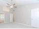 Spacious main bedroom with vaulted ceiling, ceiling fan, ensuite bathroom, and ample closet space at 855 Madison Chase Way, Lawrenceville, GA 30045