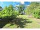 Large backyard with mature trees, a shed, and a garden at 175 Brookhaven Dr, Marietta, GA 30066