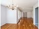 Formal dining room featuring hardwood floors, a chandelier, and ample natural light at 175 Brookhaven Dr, Marietta, GA 30066