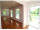 Bright entryway featuring hardwood floors and a view of the living room at 175 Brookhaven Dr, Marietta, GA 30066