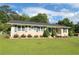 Inviting home exterior featuring landscaped front yard and walkway leading to entrance at 175 Brookhaven Dr, Marietta, GA 30066