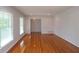 Inviting living room featuring hardwood floors, large windows, and ample space at 175 Brookhaven Dr, Marietta, GA 30066