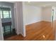 Spacious living room featuring hardwood floors and an open doorway to an adjacent room at 175 Brookhaven Dr, Marietta, GA 30066