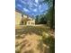 Large backyard with recently laid sod and a treeline at 222 Silvercrest Dr, Acworth, GA 30101