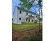New home features a covered back porch and a spacious backyard at 222 Silvercrest Dr, Acworth, GA 30101