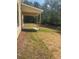 Covered back porch on a house with newly laid sod at 222 Silvercrest Dr, Acworth, GA 30101