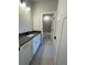 Bathroom featuring a white vanity, dark countertop, and a view into the shower/toilet room at 222 Silvercrest Dr, Acworth, GA 30101