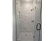 Elegant glass shower with marble tile and sleek black fixtures at 222 Silvercrest Dr, Acworth, GA 30101