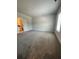 This bedroom features plush carpeting and a window offering natural light at 222 Silvercrest Dr, Acworth, GA 30101