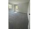 This bedroom features plush carpeting and two windows offering natural light at 222 Silvercrest Dr, Acworth, GA 30101