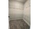 Walk-in closet featuring carpeted floors and wire shelving at 222 Silvercrest Dr, Acworth, GA 30101