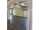 Elegant dining area with a coffered ceiling, wood floors and contemporary chandelier at 222 Silvercrest Dr, Acworth, GA 30101