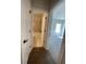 Hallway leading to bathroom and bedroom showcases wood floors at 222 Silvercrest Dr, Acworth, GA 30101