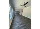 Open living room features include a ceiling fan and durable, wood-look flooring at 222 Silvercrest Dr, Acworth, GA 30101