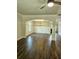 Open-concept living area featuring hardwood floors and wainscotting at 222 Silvercrest Dr, Acworth, GA 30101