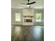 Living room with fireplace and hardwood flooring at 222 Silvercrest Dr, Acworth, GA 30101