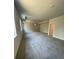 Large main bedroom showcasing plush carpet, tray ceilings, and an abundance of natural light at 222 Silvercrest Dr, Acworth, GA 30101