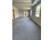 Large main bedroom boasts lots of room, neutral carpets and attached walk-in closet at 222 Silvercrest Dr, Acworth, GA 30101