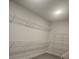 Walk-in closet with carpet and installed metal shelving at 222 Silvercrest Dr, Acworth, GA 30101
