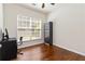 This room features wood floors and a window for natural light at 310 Hammersmith Dr, Suwanee, GA 30024