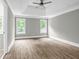 Spacious bedroom with tray ceiling, neutral color palette, and plenty of natural light at 3232 Watson Mill Dr, Loganville, GA 30052