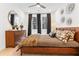 Beautiful bedroom featuring a luxurious bed, modern dresser and stylish decorative wall art at 371 Grant Se Cir # 1823, Atlanta, GA 30315