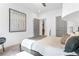 Bedroom featuring stylish artwork, soft lighting, and neutral tones at 371 Grant Se Cir # 1823, Atlanta, GA 30315