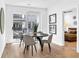 Charming dining area with sliding glass doors to a balcony, allowing for bright, natural light at 371 Grant Se Cir # 1823, Atlanta, GA 30315