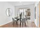Bright dining area with a round table, seating for four, and sliding glass doors to a patio at 371 Grant Se Cir # 1823, Atlanta, GA 30315
