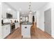 Contemporary kitchen with an island, stainless steel appliances and hardwood floors, offering both style and functionality at 371 Grant Se Cir # 1823, Atlanta, GA 30315