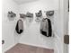 Organized walk-in closet featuring shelving and hanging space for efficient storage and organization at 371 Grant Se Cir # 1823, Atlanta, GA 30315