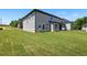Expansive backyard featuring lush green lawn and serene surroundings, ideal for relaxation and entertaining at 4191 Hosch Reserve Dr, Buford, GA 30519