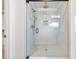 Modern shower with rainfall head and built-in niche at 4191 Hosch Reserve Dr, Buford, GA 30519