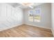 Bedroom with decorative wall trim, custom ceiling, and an abundance of natural light at 4191 Hosch Reserve Dr, Buford, GA 30519
